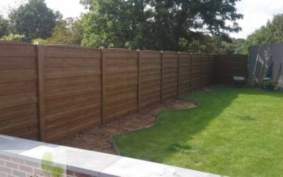 Clôture en béton à l’effet bois pour votre jardin